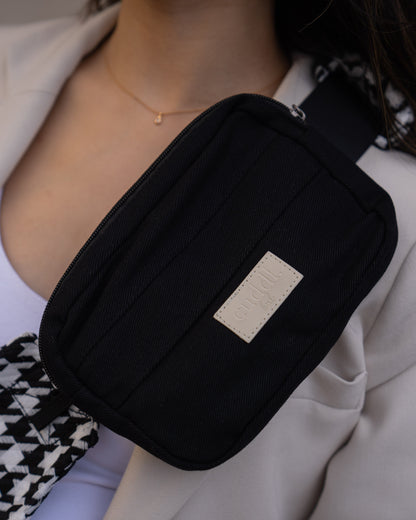 Black Houndstooth Cuddl.bub Toddler carrier/toddler sling paired with the Black Essentials slide on pouch